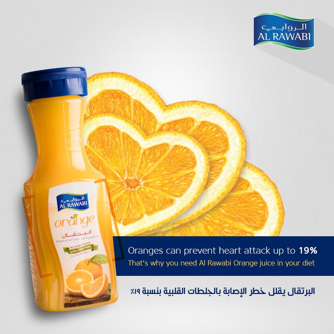 Orange juice bottle beside heart-shaped orange slices, with a caption about oranges and heart health in English and Arabic